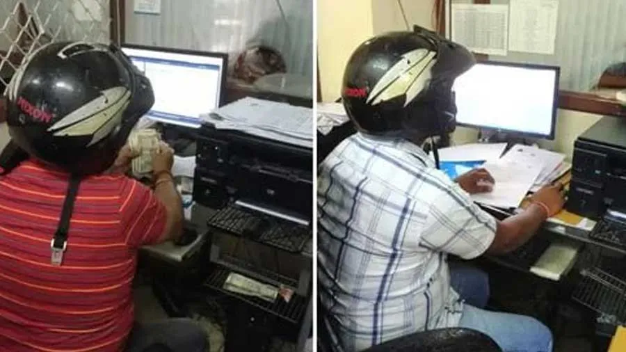 સરકારી કર્મચારીઓ હેલમેટ પહેરીને કેમ ઓફિસમાં કામ કરી રહ્યા છે?